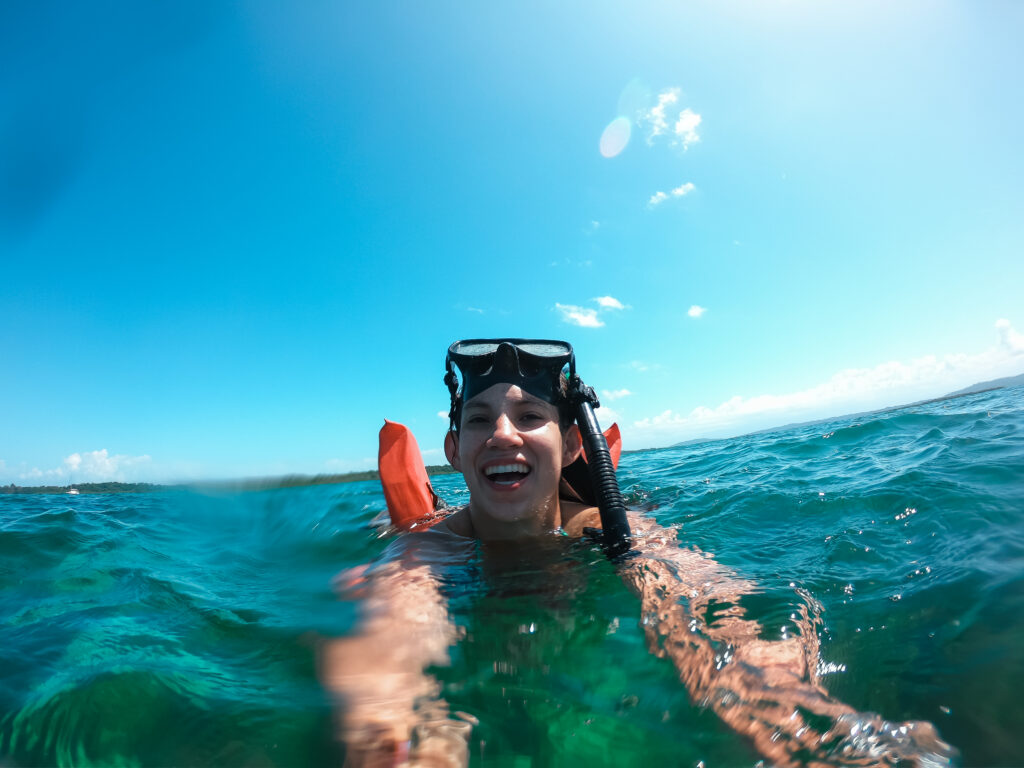 Wini snorkeling in ocean in Isla Zapatilla, Panama