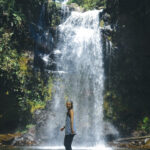 Wini on a waterfall on the Lost Waterfalls Trail in Boquete, Panama