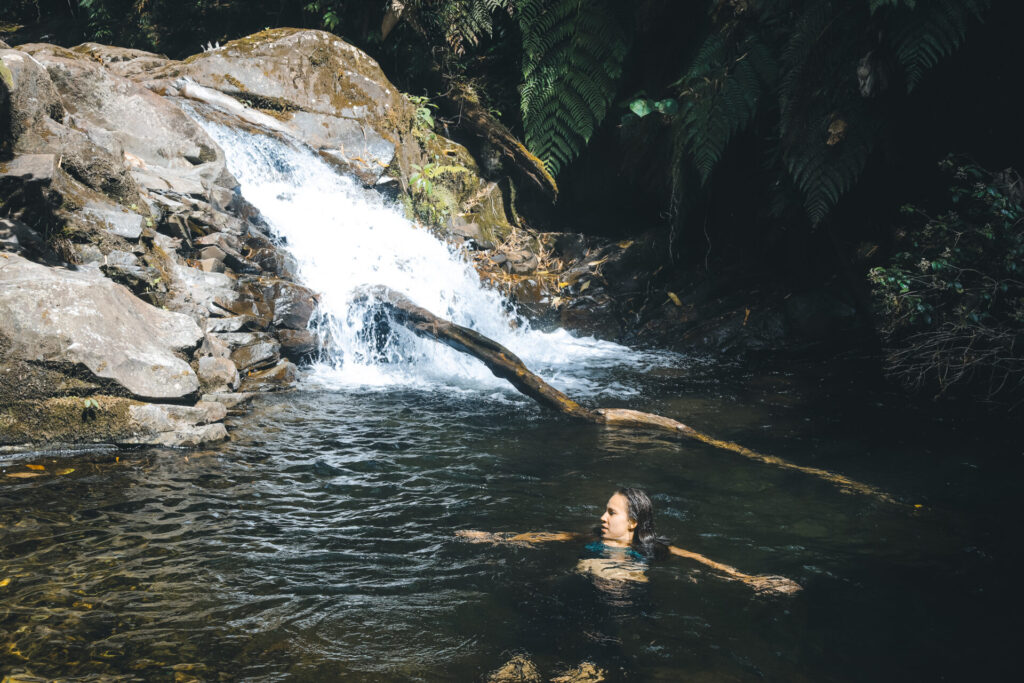 Wini swimming on the Lost Waterfalls Trail in Boquete, Panama