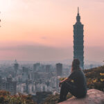 Wini overlooking Taipei 101 at the top of Elephant Mountain at sunset