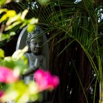 Nha Trang Po Nagar Temple Statue and Flowers, Vietnam