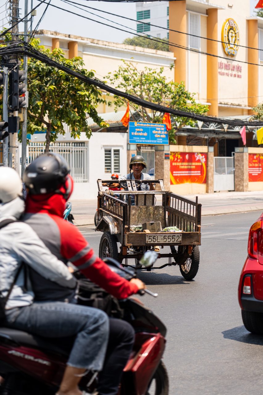 Man crossing street in Ho Chi Minh City, Vietnam