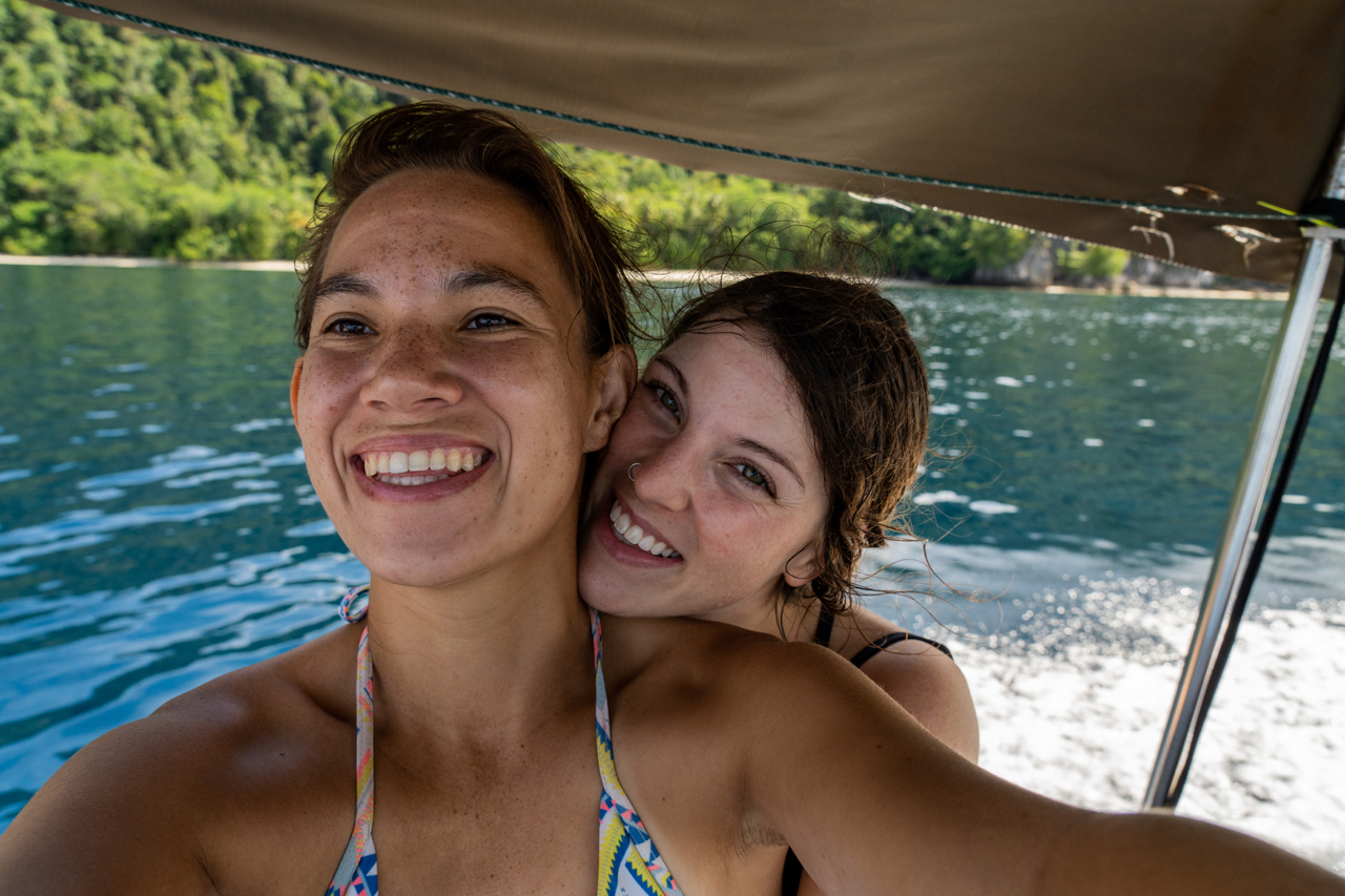 Sarah and Wini selfie on a boat in the ocean. Raja Ampat, Indonesia.