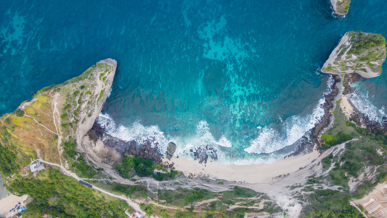 Diamond Beach aerial drone view of the white sand beach against turquoise ocean