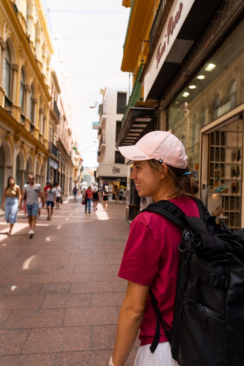 Wini backpacking through the streets of Seville, Spain