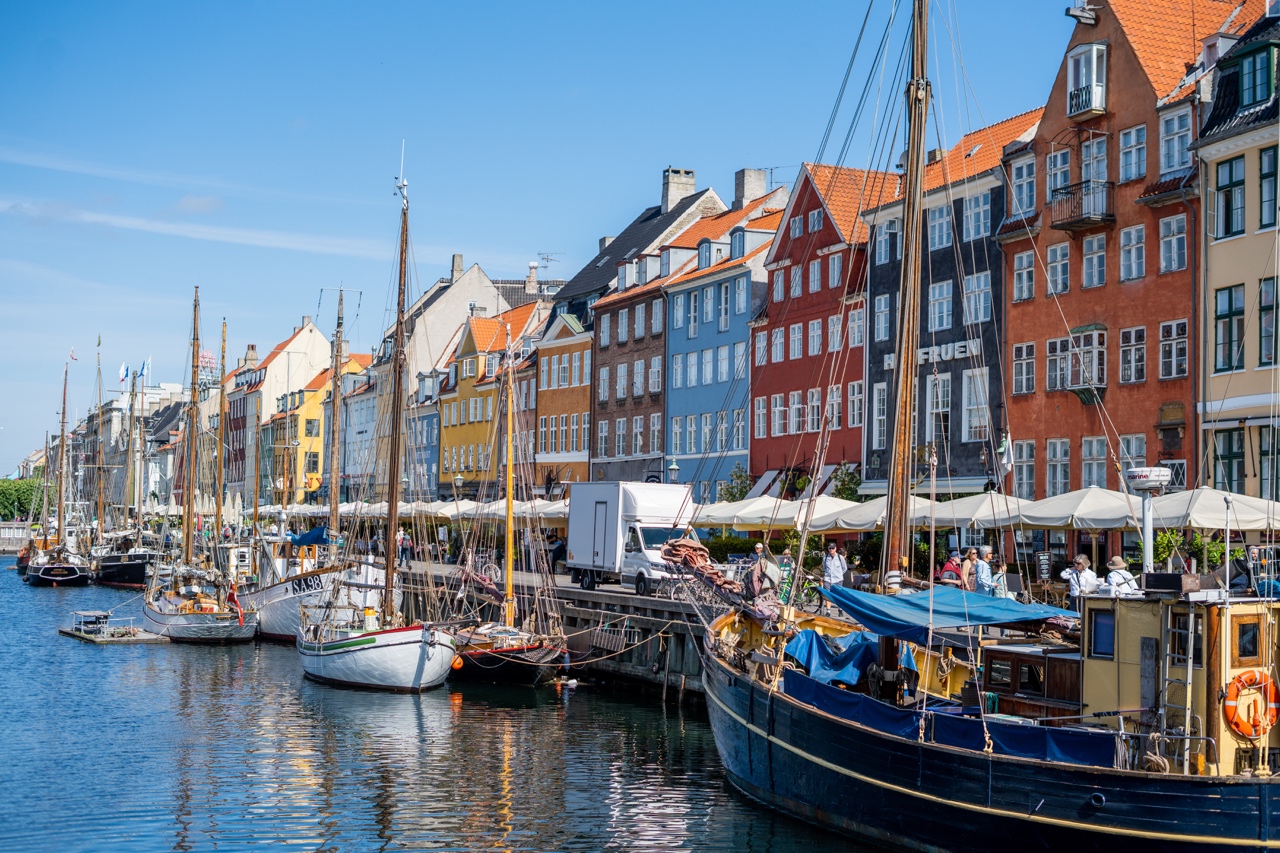 Nyhavn Canal, on a blue sunny summer day in Copenhagen, Denmark