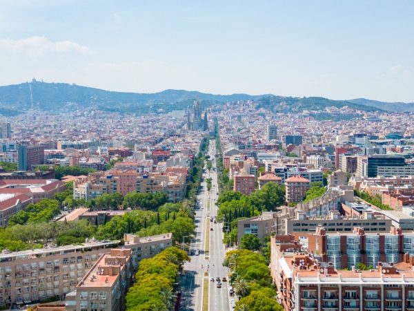 Barcelona drone shot from the Barcelona Beach that views the Sagrada Familia. Sights to see in Barcelona on a budget.